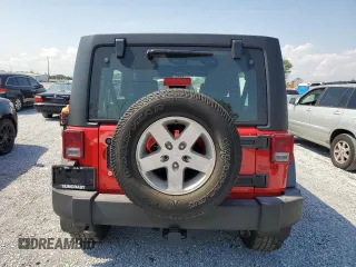 2015 Jeep Wrangler Unlimited Willys Wheeler with VIN 1C4BJWDG3FL726460, listed as a Copart auction lot 55827355 with 96,482 mi miles and Salvage Title. Bid and sale history available at DreamBid. Image 6.