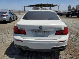 2014 BMW 7 Series 740Li with VIN WBAYE4C57ED137727, listed as a Copart auction lot 51847244 with 136,495 mi miles and Salvage Title. Bid and sale history available at carsss.com. Image 6.