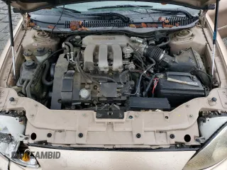 1996 Mercury Sable LS z VIN 1MELM53S0TA607489, wystawiony jako Copart lot #85730734 z przebiegiem 113 214 mil mil oraz Szkody całkowita. Historia ofert i sprzedaży dostępna na DreamBid. Obrazek 11.