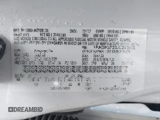 2018 Ford Focus SE with VIN 1FADP3F23JL242066, listed as a IAAI auction lot 41804512 with 99,662 mi miles. Bid and sale history available at carsss.com. Image 9.