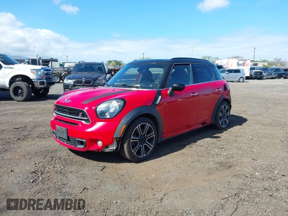 2015 MINI Countryman S with VIN WMWZC3C52FWT05204, listed as a IAAI auction lot 41492775 with 80,785 mi miles and . Bid and sale history available at DreamBid. Image 2.