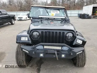 2002 Jeep Wrangler Sahara with VIN 1J4FA59S02P740550, listed as a Copart auction lot 47607795 with 182,187 mi miles and Salvage Title. Bid and sale history available at carsss.com. Image 5.