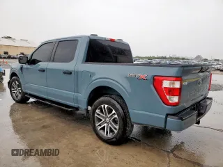 2023 Ford F-150 XL with VIN 1FTEW1CP3PKF86310, listed as a Copart auction lot 60575065 with 29,548 mi miles and Salvage title. Bid and sale history available at DreamBid. Image 2.