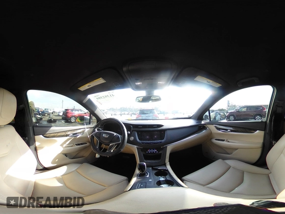 2017 Cadillac XT5 FWD with VIN 1GYKNARS7HZ144148, listed as a IAAI auction lot 41392399 with 96,252 mi miles and . Bid and sale history available at carsss.com. Image 19.