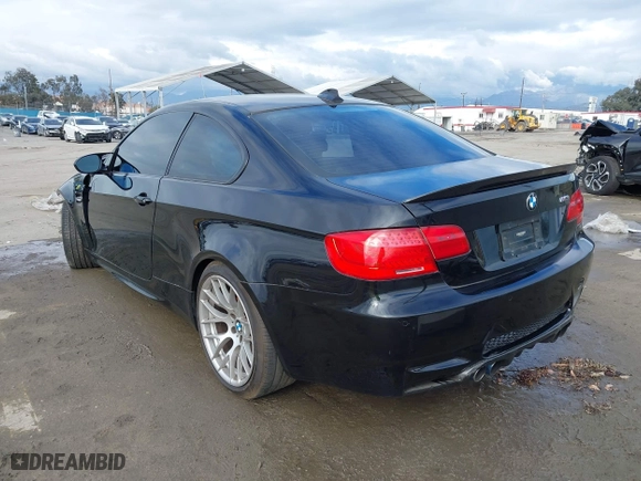 2011 BMW M3 with VIN WBSKG9C53BE796967, listed as a IAAI auction lot 40509145 with 195,085 mi miles. Bid and sale history available at carsss.com. Image 3.