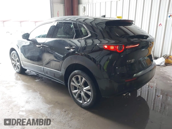 2023 Mazda CX-30 S Premium z VIN 3MVDMBDM5PM589289, wystawiony jako IAAI lot #41331253 z przebiegiem 24 804 mil mil oraz . Historia ofert i sprzedaży dostępna na DreamBid. Obrazek 3.