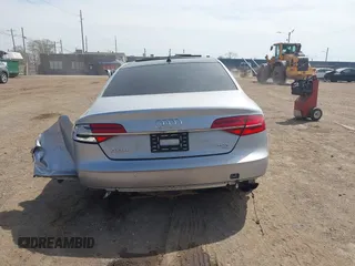 2016 Audi A8 Sport z VIN WAU43AFD0GN011518, wystawiony jako IAAI lot #42096343 z przebiegiem Nie podano mil oraz . Historia ofert i sprzedaży dostępna na DreamBid. Obrazek 16.