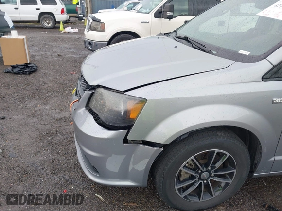 2014 Dodge Grand Caravan SXT with VIN 2C4RDGCG3ER451465, listed as a IAAI auction lot 42111958 with 176,707 mi miles and . Bid and sale history available at DreamBid. Image 6.