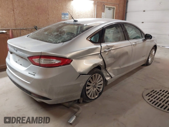 2015 Ford Fusion SE Hybrid with VIN 3FA6P0LU4FR151040, listed as a IAAI auction lot 41376155 with 120,486 mi miles. Bid and sale history available at carsss.com. Image 4.