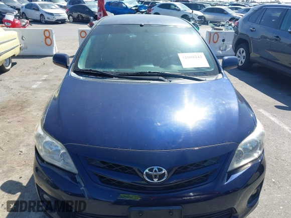 2012 Toyota Corolla L with VIN 2T1BU4EE3CC779137, listed as a IAAI auction lot 42008243 with 123,760 mi miles. Bid and sale history available at carsss.com. Image 13.