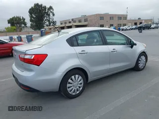 2014 Kia Rio LX with VIN KNADM4A3XE6363851, listed as a IAAI auction lot 42111189 with 144,122 mi miles and . Bid and sale history available at DreamBid. Image 4.