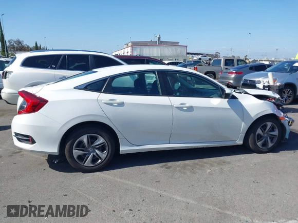 2020 Honda Civic LX z VIN 19XFC2F67LE212561, wystawiony jako IAAI lot #42272481 z przebiegiem 50 681 mil mil oraz . Historia ofert i sprzedaży dostępna na DreamBid. Obrazek 14.
