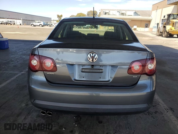 2010 Volkswagen Jetta S with VIN 3VWJZ7AJ9AM052569, listed as a Copart auction lot 59016965 with 166,950 mi miles and Salvage title. Bid and sale history available at DreamBid. Image 6.