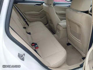 2015 BMW X1 sDrive28i with VIN WBAVM1C50FV314957, listed as a IAAI auction lot 41816402 with 148,410 mi miles. Bid and sale history available at carsss.com. Image 8.