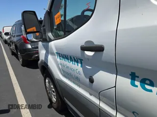 2018 Ford Transit with VIN 1FTYE1YM9JKB52270, listed as a IAAI auction lot 42714304 with 95,416 mi miles and . Bid and sale history available at DreamBid. Image 32.