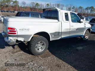 1998 Ford F-150 with VIN 2FTZX08W0WCA98105, listed as a IAAI auction lot 40930475 with Not provided miles and . Bid and sale history available at DreamBid. Image 4.