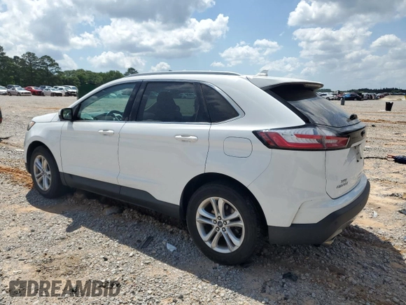 2020 Ford Edge SEL z VIN 2FMPK3J94LBA57940, wystawiony jako Copart lot #54901165 z przebiegiem 117 096 mil mil oraz Szkoda całkowita • Salvage title. Historia ofert i sprzedaży dostępna na DreamBid. Obrazek 2.