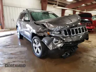 2014 Jeep Grand Cherokee Limited z VIN 1C4RJFBG3EC518921, wystawiony jako Copart lot #58147805 z przebiegiem 156 076 mil mil oraz Czysty tytuł • Clean title. Historia ofert i sprzedaży dostępna na DreamBid. Obrazek 14.