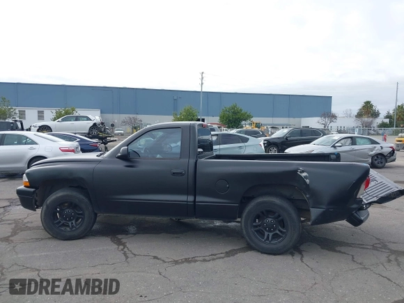2004 Dodge Dakota with VIN 1D7FL16K64S578877, listed as a IAAI auction lot 41568126 with 93,657 mi miles. Bid and sale history available at carsss.com. Image 14.