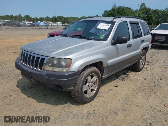 2003 Jeep Grand Cherokee Laredo with VIN 1J4GW48S83C558962, listed as a IAAI auction lot 42415803 with 312,419 mi miles and . Bid and sale history available at DreamBid. Image 2.