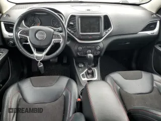 2015 Jeep Cherokee Trailhawk с VIN 1C4PJMBS6FW501367, выставлен на аукционе Copart как лот 59855355 с пробегом 113 711 миль миль и Списание • Salvage title. История ставок и продаж доступна на DreamBid. Изображение 8.