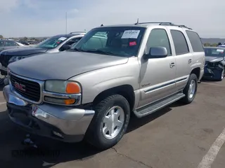 2004 GMC Yukon SLT with VIN 1GKEK13Z54R144181, listed as a IAAI auction lot 41702834 with 146,827 mi miles. Bid and sale history available at carsss.com. Image 2.
