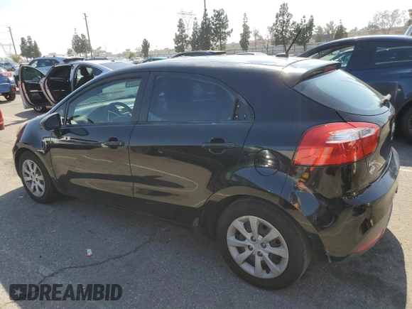 2012 Kia Rio LX with VIN KNADM5A3XC6015728, listed as a Copart auction lot 54952215 with 186,348 mi miles and Salvage Title. Bid and sale history available at DreamBid. Image 2.