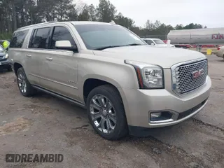 2015 GMC Yukon XL Denali with VIN 1GKS1JKJXFR661920, listed as a IAAI auction lot 41595990 with 196,563 mi miles. Bid and sale history available at carsss.com. Image 1.