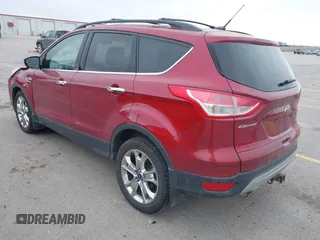 2014 Ford Escape SE with VIN 1FMCU9G90EUD89356, listed as a IAAI auction lot 41841229 with 148,997 mi miles and . Bid and sale history available at carsss.com. Image 3.