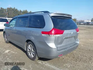2011 Toyota Sienna XLE with VIN 5TDDK3DC0BS012604, listed as a IAAI auction lot 41533173 with 174,779 mi miles. Bid and sale history available at carsss.com. Image 3.