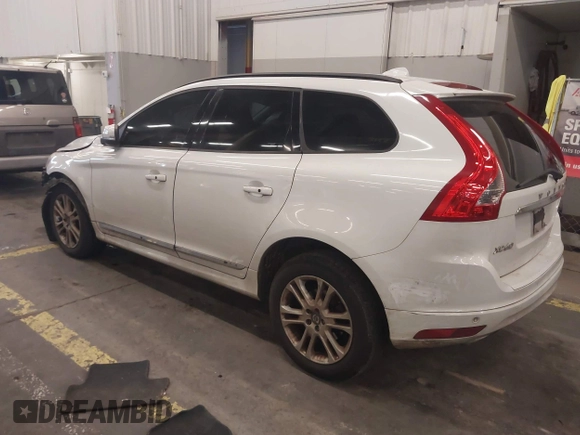 2016 Volvo XC60 T5 Drive-E z VIN YV440MDJ0G2920301, wystawiony jako IAAI lot #40956289 z przebiegiem 137 565 mil mil oraz . Historia ofert i sprzedaży dostępna na DreamBid. Obrazek 3.