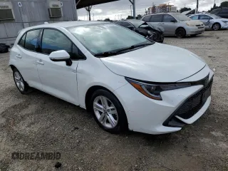 2020 Toyota Corolla Hatchback SE with VIN JTND4RBEXL3090940, listed as a Copart auction lot 77747284 with 58,201 mi miles and Salvage Title. Bid and sale history available at carsss.com. Image 4.