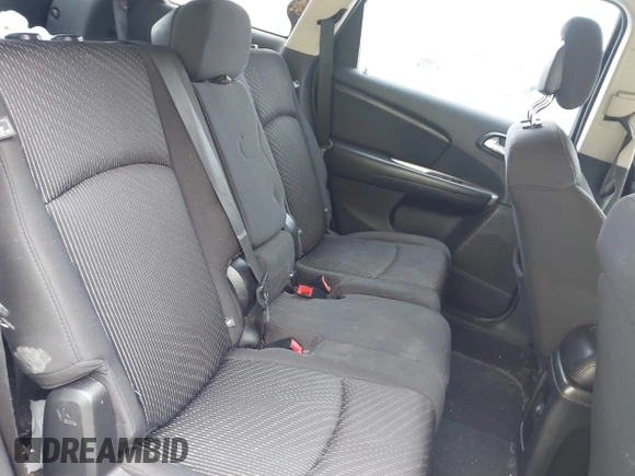 2013 Dodge Journey SE z VIN 3C4PDCAB2DT577805, wystawiony jako IAAI lot #41674351 z przebiegiem 183 006 mil mil oraz . Historia ofert i sprzedaży dostępna na DreamBid. Obrazek 8.