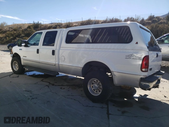 2000 Ford F-350 XL with VIN 1FTSW31F5YEA50810, listed as a Copart auction lot 77443774 with 147,370 mi miles and Salvage Title. Bid and sale history available at DreamBid. Image 2.