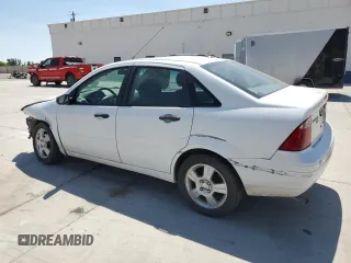 2005 Ford Focus S with VIN 1FAFP34N05W296550, listed as a Copart auction lot 59391835 with 216,509 mi miles and Salvage title. Bid and sale history available at DreamBid. Image 2.