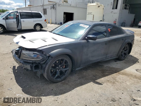 2015 Dodge Charger RT with VIN 2C3CDXCT9FH784672, listed as a Copart auction lot 58190615 with 121,033 mi miles and Salvage title. Bid and sale history available at DreamBid. Image 1.