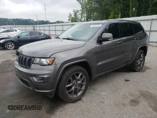 2021 Jeep Grand Cherokee 80th Anniversary с VIN 1C4RJEBG7MC679667, выставлен на аукционе Copart как лот 54167225 с пробегом 77 268 миль миль и Списание • Salvage title. История ставок и продаж доступна на DreamBid. Изображение 1.