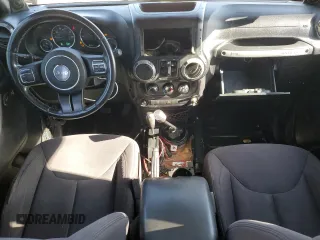 2014 Jeep Wrangler Unlimited Sport with VIN 1C4BJWDG1EL308834, listed as a Copart auction lot 53710065 with 127,612 mi miles and Clean Title. Bid and sale history available at DreamBid. Image 8.