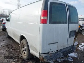 2010 Chevrolet Express Cargo Van with VIN 1GCUGADX6A1154119, listed as a IAAI auction lot 41608254 with 156,816 mi miles. Bid and sale history available at carsss.com. Image 3.