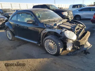 2013 Volkswagen Beetle with VIN 3VWHX7AT0DM681633, listed as a Copart auction lot 43077395 with 37,369 mi miles and Salvage title. Bid and sale history available at DreamBid. Image 4.