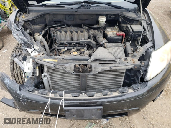 2010 Mitsubishi Endeavor SE z VIN 4A4JN3AS2AE007004, wystawiony jako Copart lot #58771424 z przebiegiem 125 284 mil mil oraz Szkoda całkowita • Salvage title. Historia ofert i sprzedaży dostępna na DreamBid. Obrazek 11.