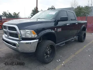 2017 Ram 2500 SLT with VIN 3C6UR5DL1HG759215, listed as a IAAI auction lot 41457317 with 114,939 mi miles and . Bid and sale history available at DreamBid. Image 2.