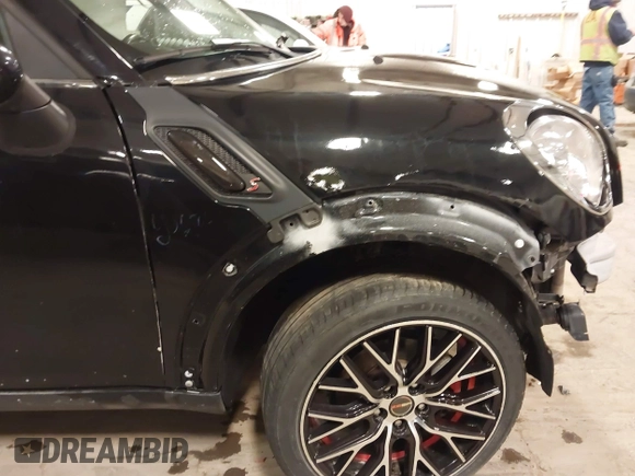 2012 MINI Countryman with VIN WMWZB3C53CWM05133, listed as a IAAI auction lot 41493309 with 114,412 mi miles and . Bid and sale history available at DreamBid. Image 20.