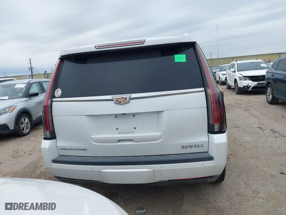 2016 Cadillac Escalade Platinum with VIN 1GYS3DKJ0GR405742, listed as a IAAI auction lot 41639802 with 77,576 mi miles. Bid and sale history available at carsss.com. Image 16.