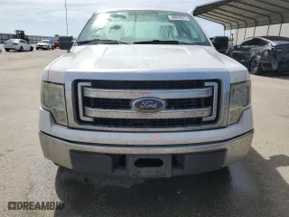 2014 Ford F-150 XL with VIN 1FTNF1CF5EKD21179, listed as a Copart auction lot 48916575 with 150,958 mi miles and Salvage Title. Bid and sale history available at carsss.com. Image 5.