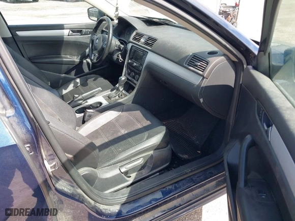 2013 Volkswagen Passat TDI SE w/Sunroof with VIN 1VWBN7A35DC069036, listed as a IAAI auction lot 41877869 with 130,242 mi miles. Bid and sale history available at carsss.com. Image 5.