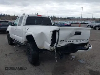 2022 Toyota Tacoma SR with VIN 3TYSX5EN1NT010664, listed as a IAAI auction lot 41642295 with 29,848 mi miles and . Bid and sale history available at DreamBid. Image 6.