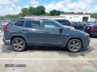 2016 Jeep Cherokee Latitude with VIN 1C4PJLCBXGW284156, listed as a IAAI auction lot 42264152 with 117,327 mi miles and . Bid and sale history available at DreamBid. Image 13.