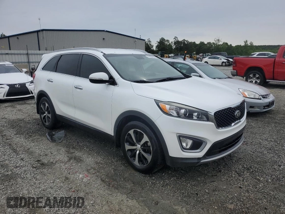 2016 Kia Sorento EX with VIN 5XYPH4A52GG125241, listed as a Copart auction lot 55995805 with 128,788 mi miles and Salvage title. Bid and sale history available at DreamBid. Image 4.