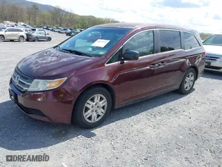 2011 Honda Odyssey LX with VIN 5FNRL5H28BB088074, listed as a IAAI auction lot 42033376 with 199,148 mi miles. Bid and sale history available at carsss.com. Image 2.